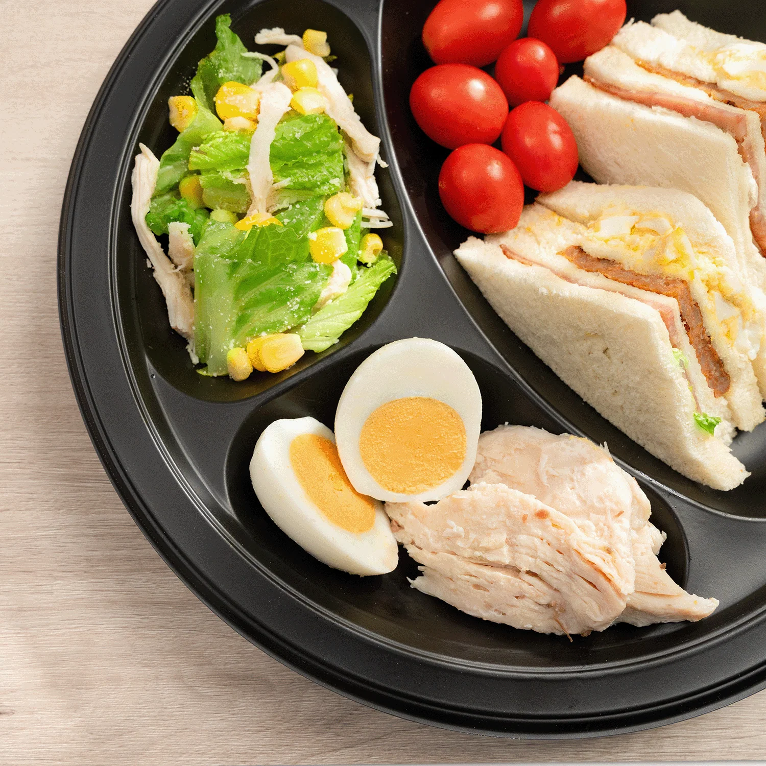 Karat Earth 3 Compartments, 10.25" Mineral Filled PP Round Plates, Black - 500 pcs - Image 3
